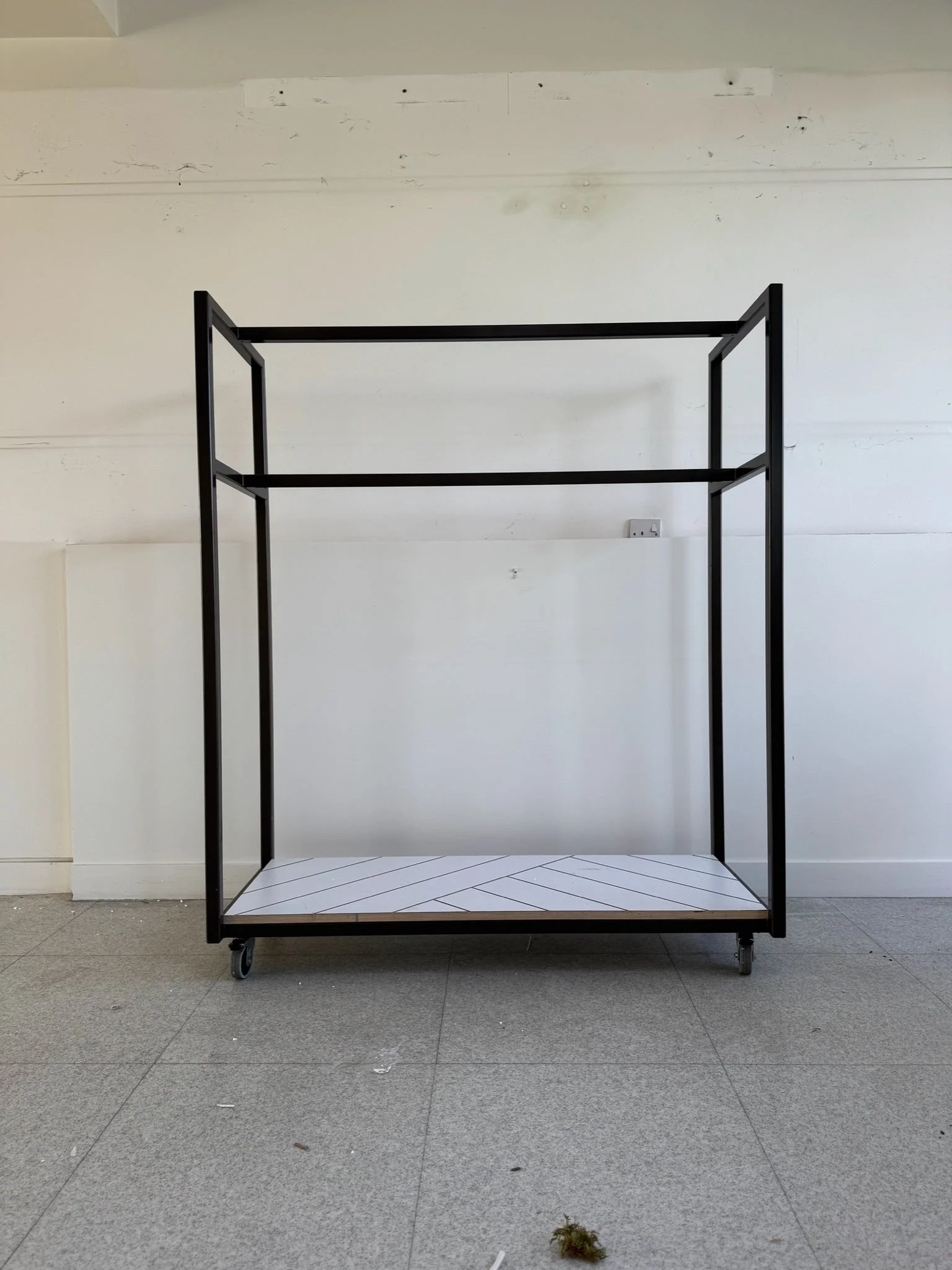 Sophisticated clothes rail with geometric design base - 9 available